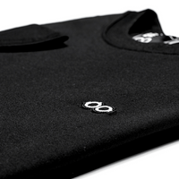 00016 Camiseta Become negra con logo